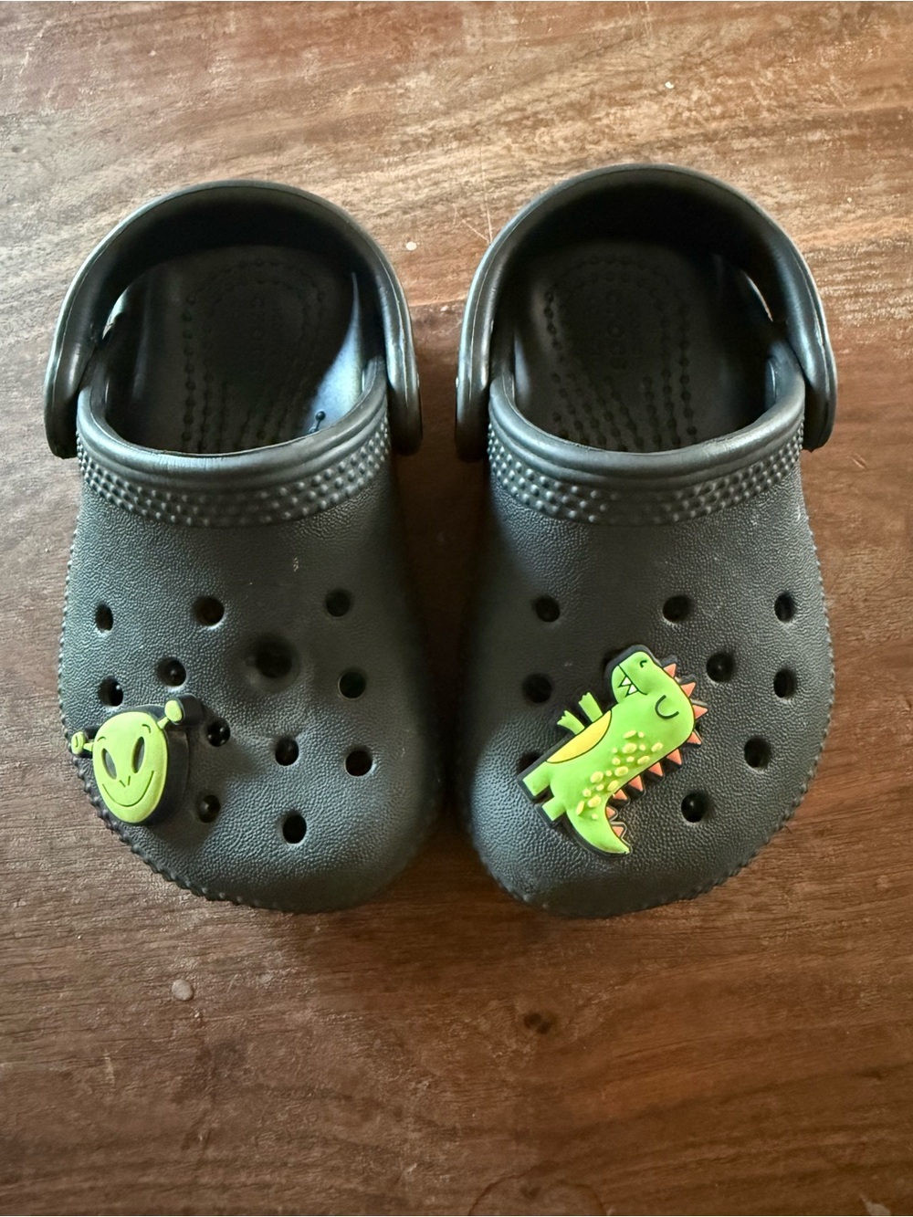 CROCS Kids Black Clogs with Green Dinosaur and Alien Charms